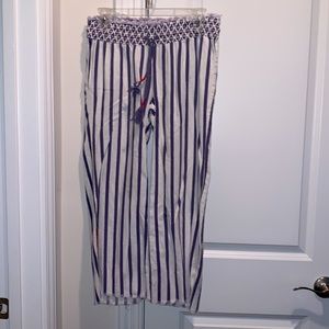 Blue striped flow pants with red accents by Ordigo Rein